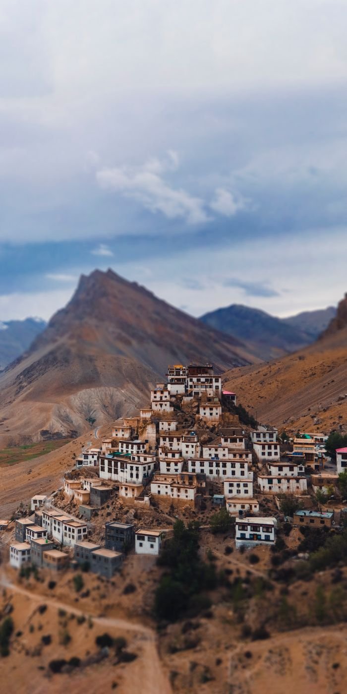about-header Aerial view of the Key Monastery nestled in the rugged Spiti Valley, Himachal Pradesh, India.